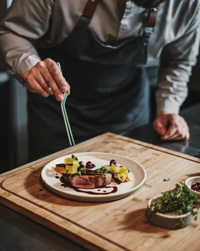 Post: chef plating a dish